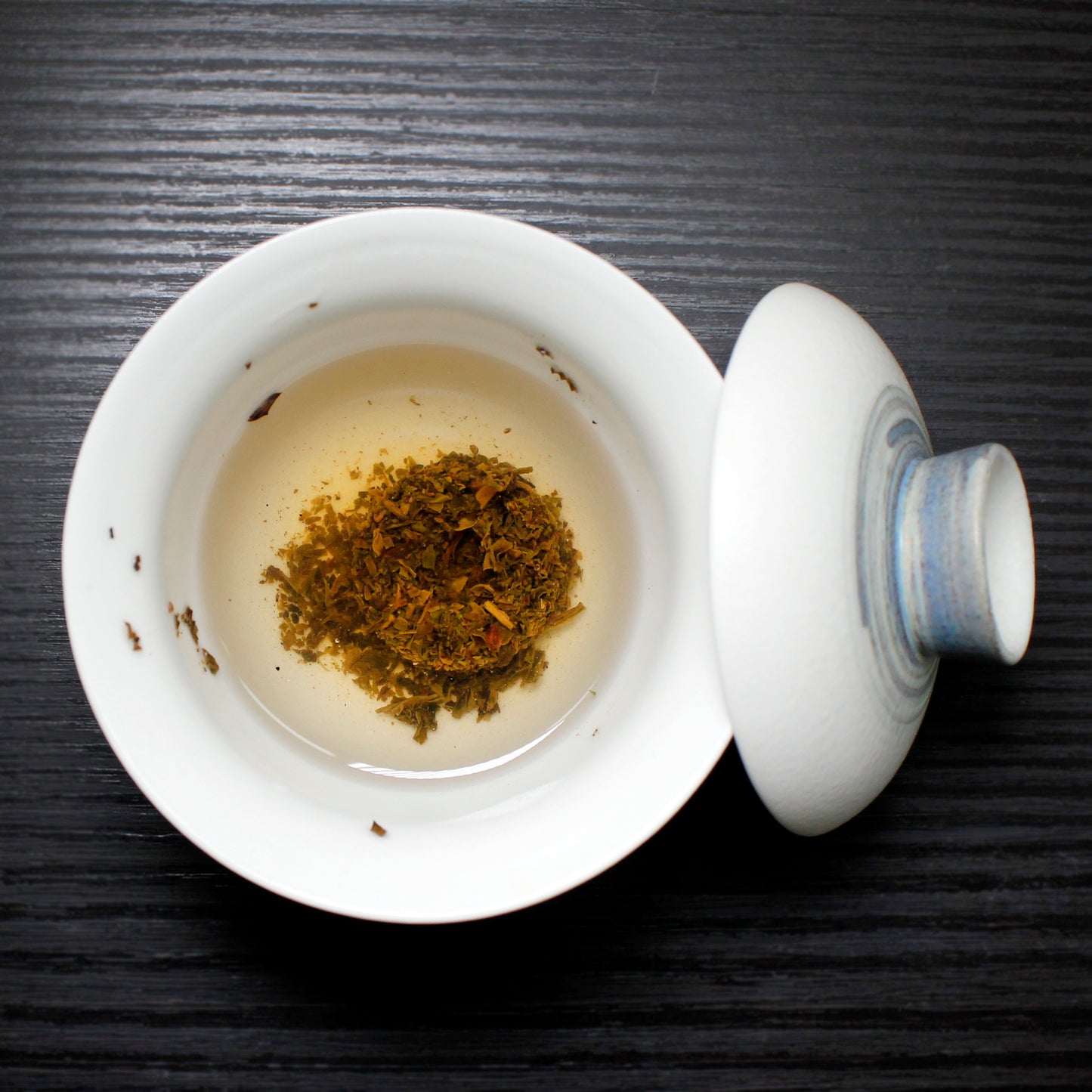 Lincang Half Dollar: 2011 Sheng Pu-Erh