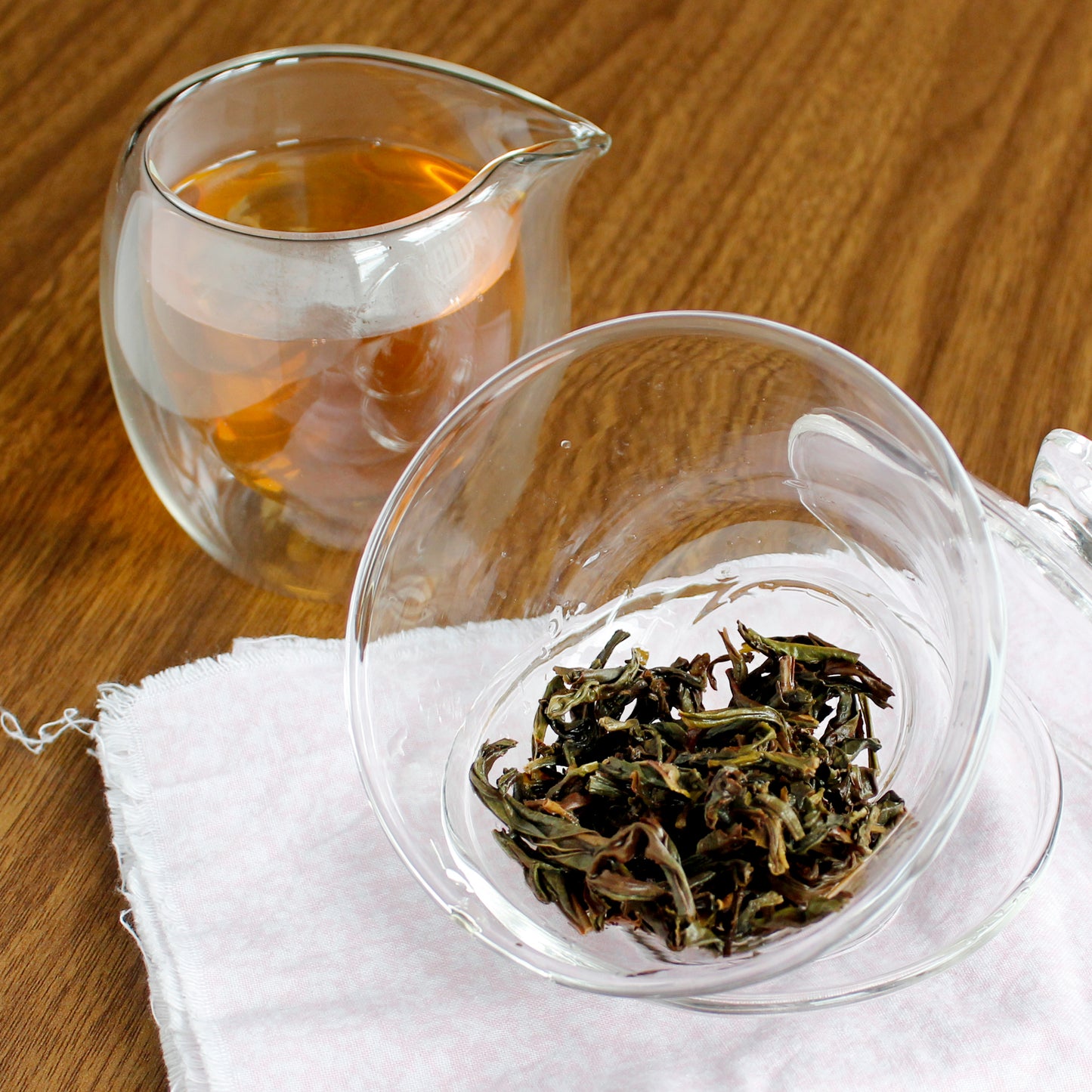 Imperial Dancong: Single Trunk - wet leaves in a Gawain, bubble pitcher filled with tea. Tasting Notes:
grilled peach • burnt caramel • orchid