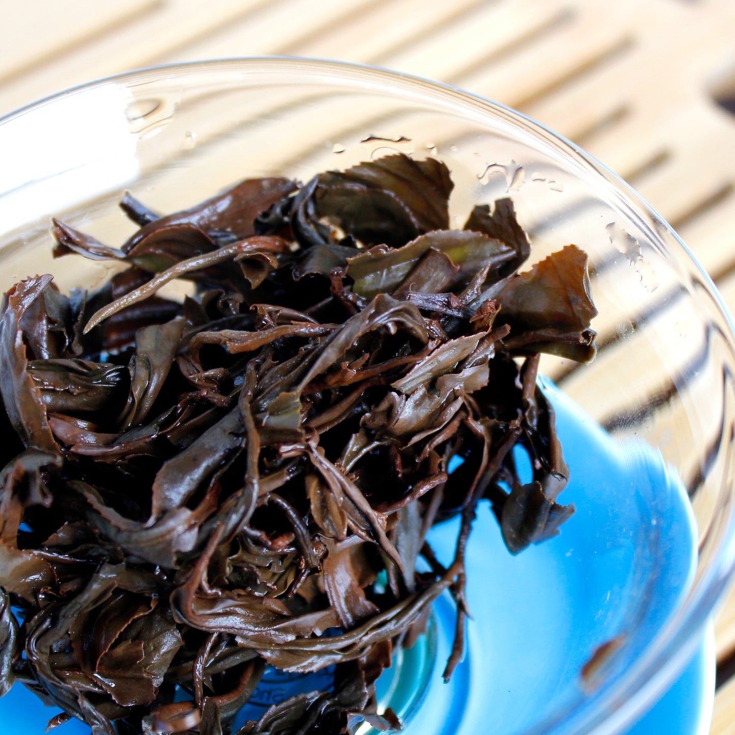 Yunnan: Purple Twists - wet leaves in glass cup. Tasting Notes:
cherrywood • plum • melon