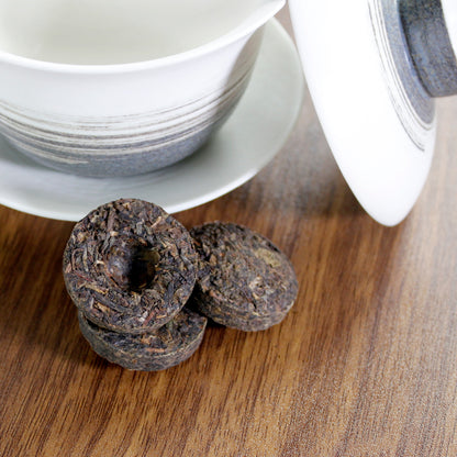 Lincang Half Dollar: 2011 Sheng Pu-Erh - loose