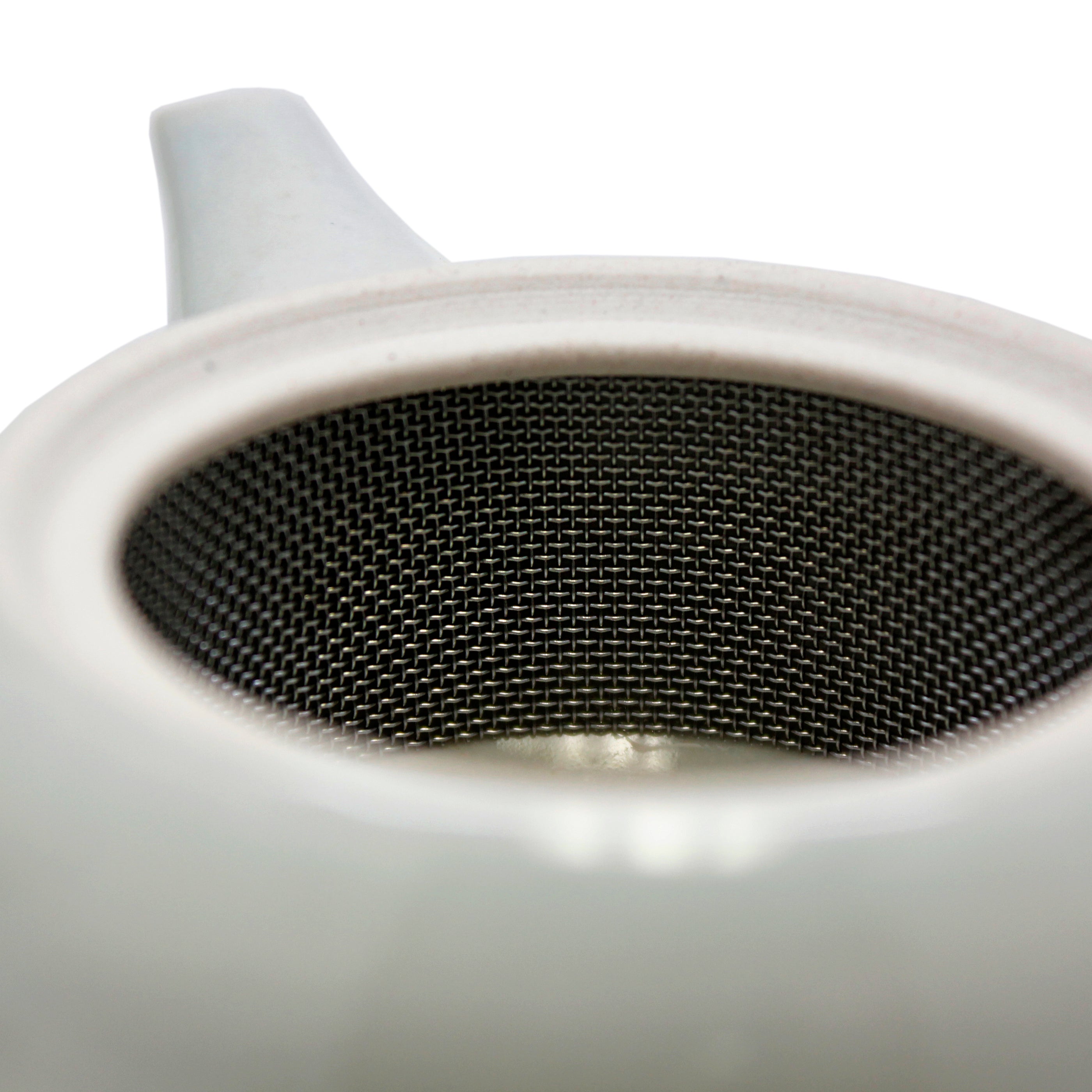 Inside of tea pot to show strainer. 