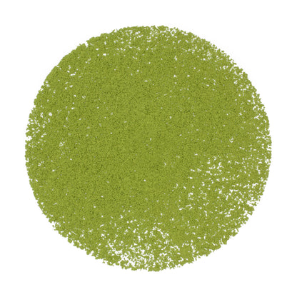 Loose pile of Gabaron Ceremonial Grade Matcha - Marukyu Koyamaen on a white background. Ingredients: Camellia sinensis leaves.