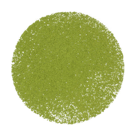 Loose pile of Gabaron Ceremonial Grade Matcha - Marukyu Koyamaen on a white background. Ingredients: Camellia sinensis leaves.